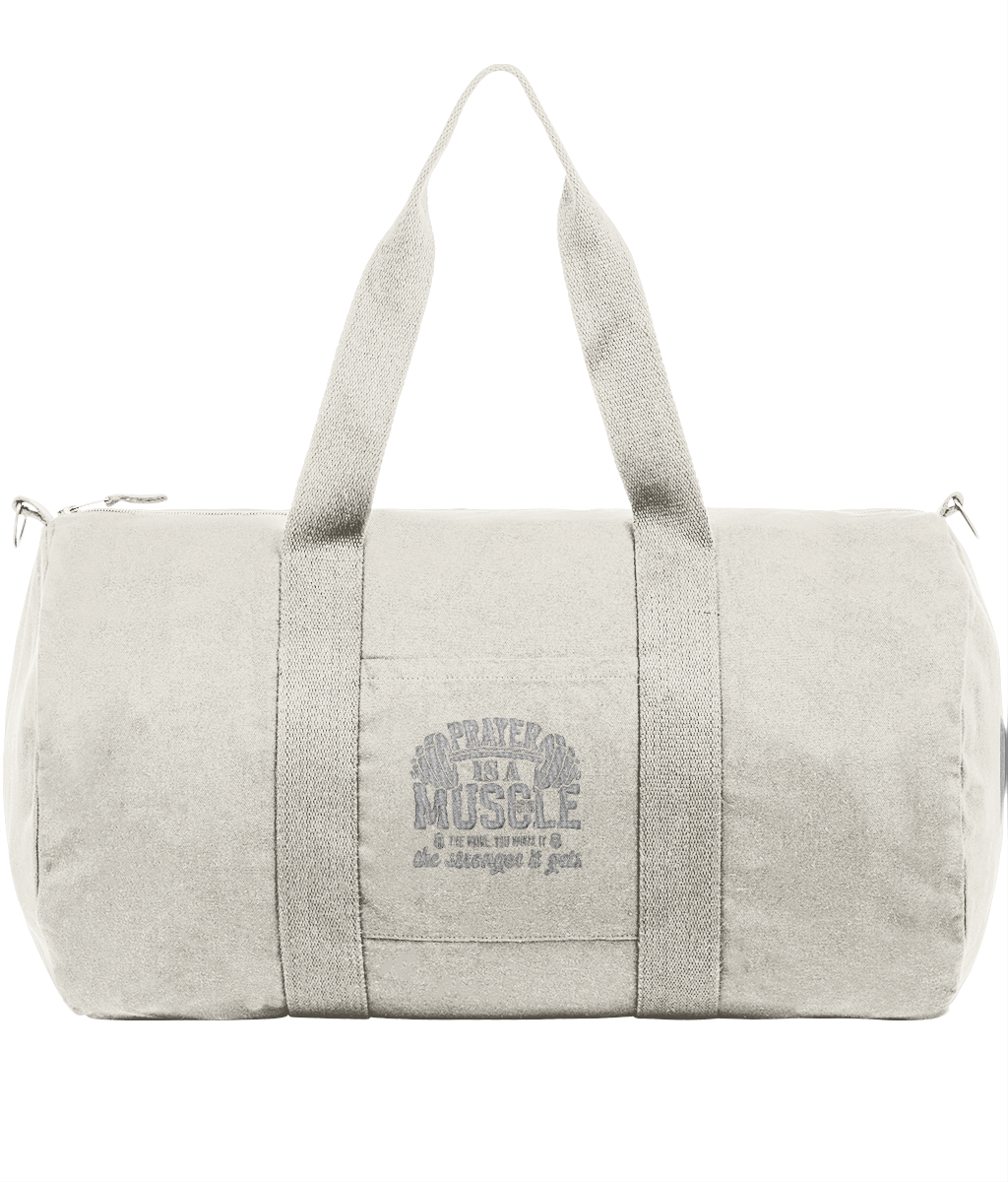 White recycled cotton canvas duffle bag with grosgrain handles and Prayer Muscle printed text on front pocket