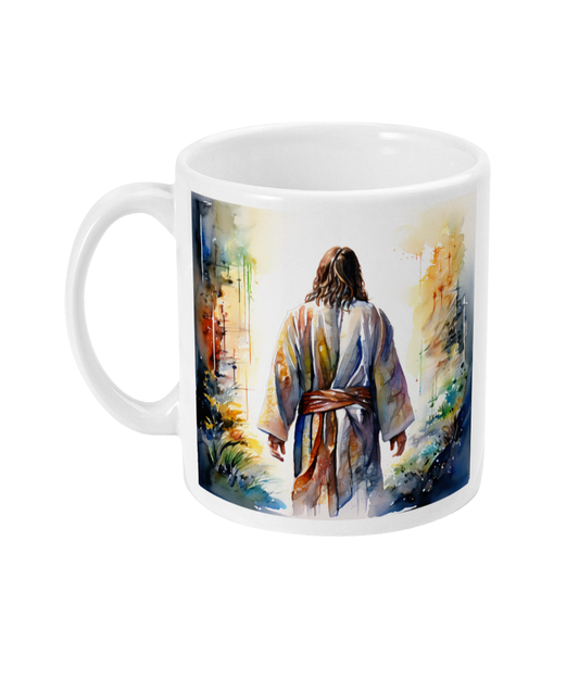 White ceramic mug with a colorful watercolor image of Jesus from behind, walking through a vibrant path.